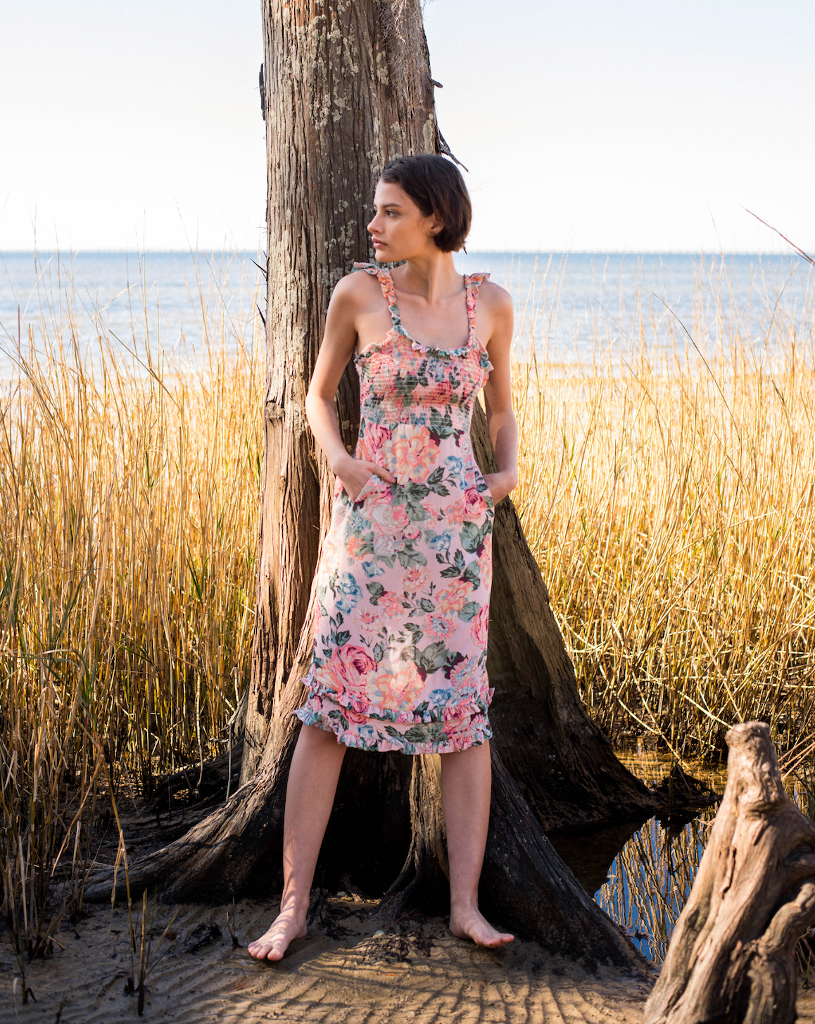 Pink floral midi dress with pockets  & smocked top . Ruffles on straps and skirt with scoop back