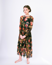 Load image into Gallery viewer, Front of floral print brown mesh overlay a-line dress with long sleeves over attached satin slip on woman
